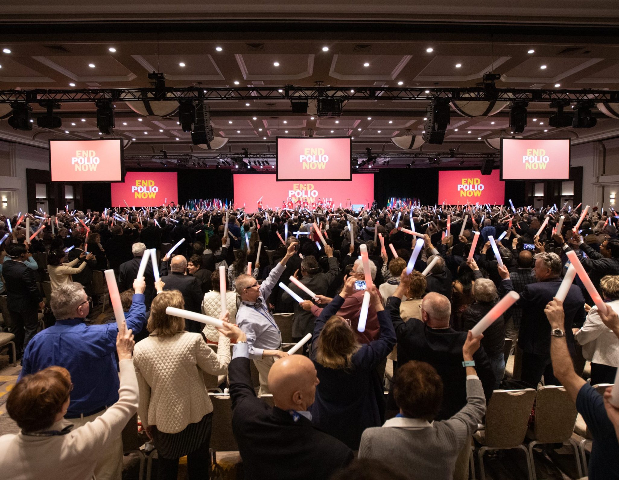 Attendees celebrate the announcement that Rotary and the Bill & Melina Gates Foundation will extend their fundraising partnership to eradicate polio at General Session 5. International Assembly, 22 January 2020, San Diego, California, USA.